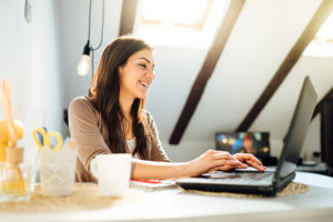 Business Woman Working From Home On Laptop Computer.checking Ema