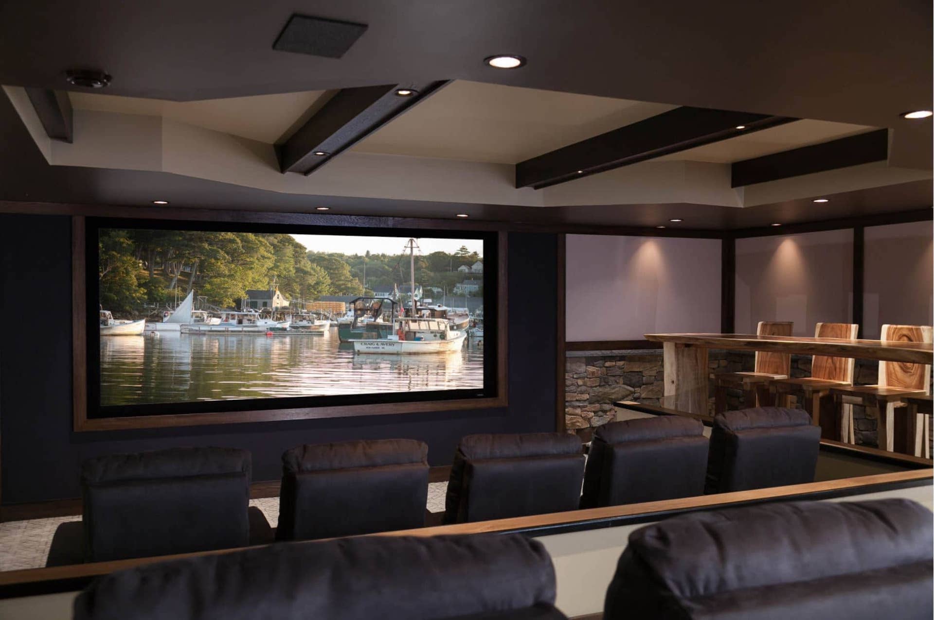 In this Maryland home theater, high quality visuals and a comfortable environment make the experience.
